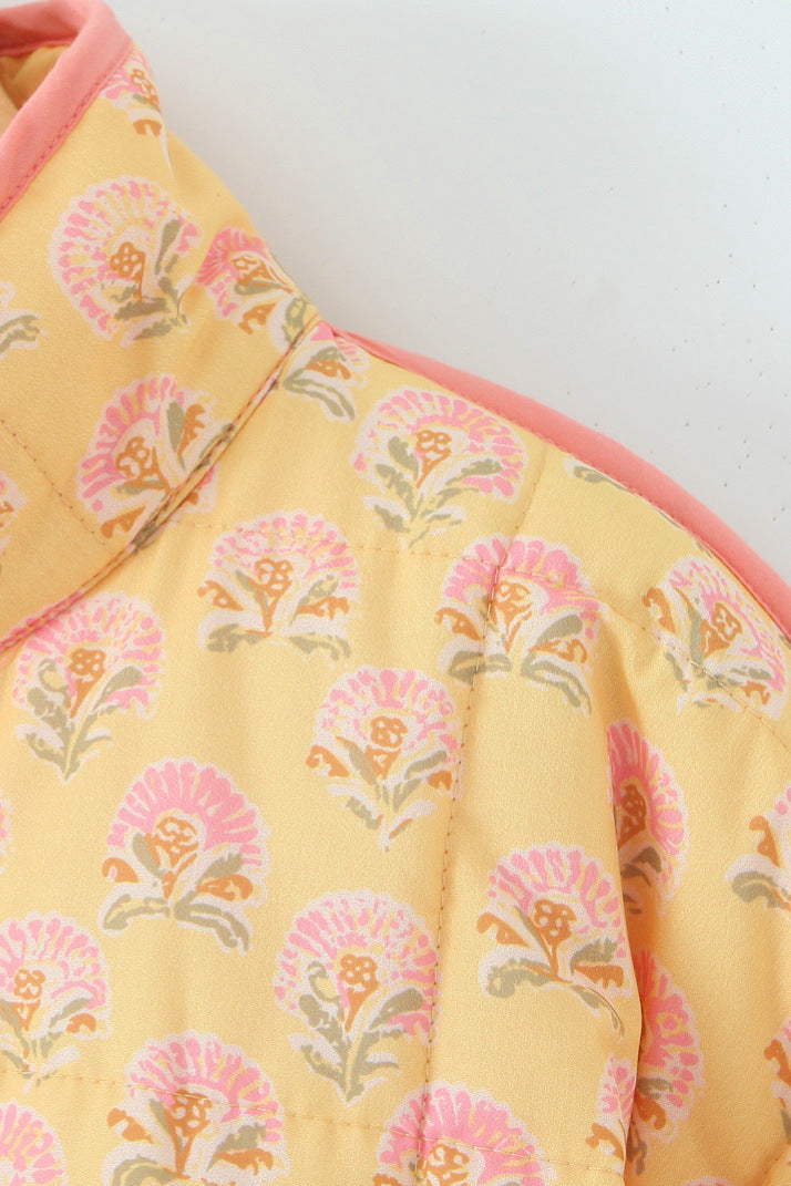 Jas met patchwork en bloemenprint en staande kraag