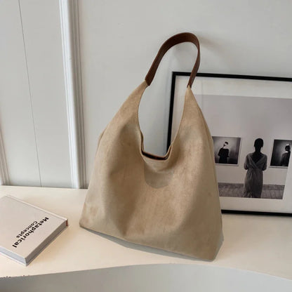BEYONDA | Chique suède schoudertas met tijdloos design